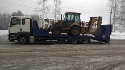 Фото эвакуатора для перевозки экскаватора