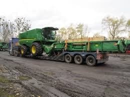 Фото эвакуатора для перевозки комбайна